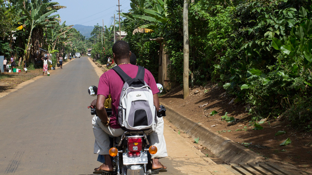 Alex-Keller on a Mototaxi